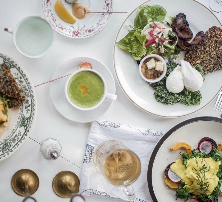 A spread of brunch items at Nourish Kitchen & Cafe in Victoria, BC