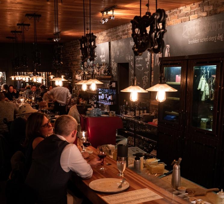 Diners enjoy dinner service at Vis-a-Vis in the Oak Bay neighbourhood of Victoria, BC
