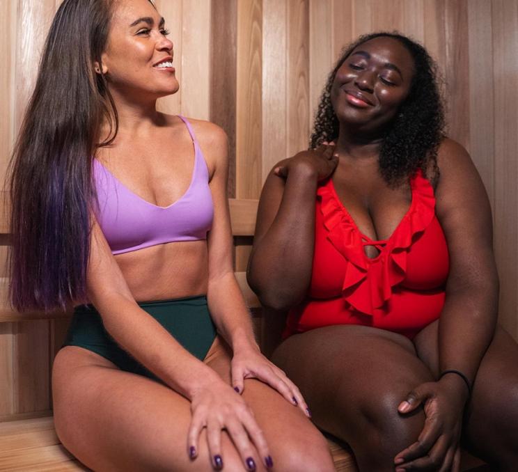 Two friends share a sauna at RITUAL Nordic Spa in Victoria, BC