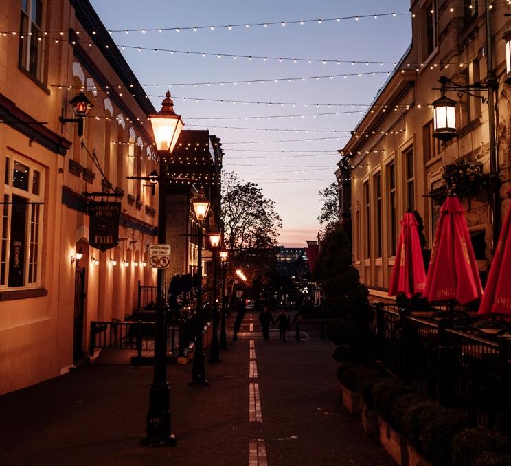 A view down Bastion Square in downtown Victoria, BC at sunset