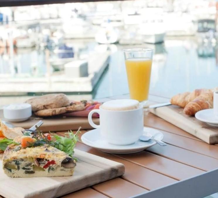 A spread of food and drinks at Marina Dockside Eatery in Victoria, BC