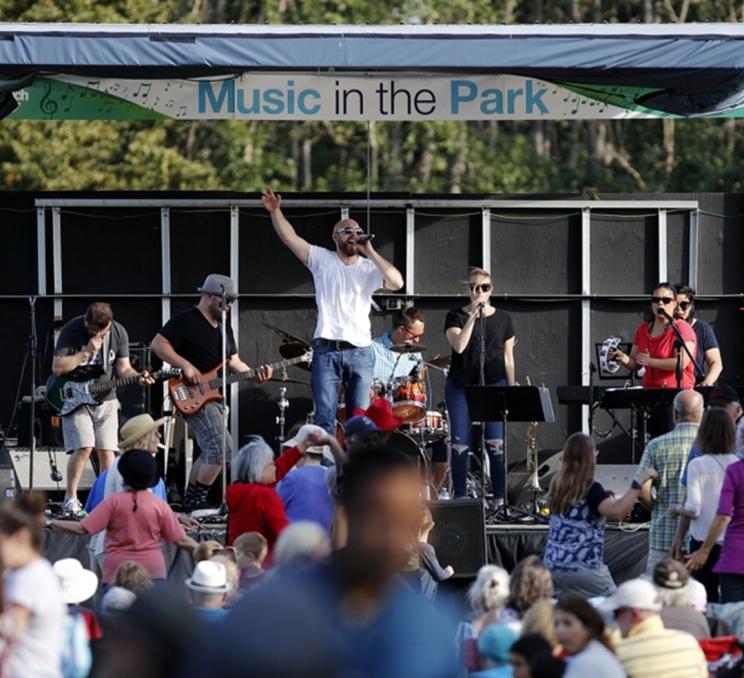 A performance during Music in the Park in Saanich in Greater Victoria, BC