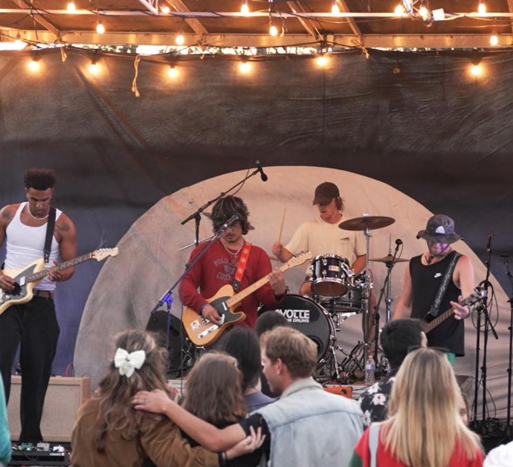 A band plays on stage at the Sooke Music & Arts Festival in Victoria, BC