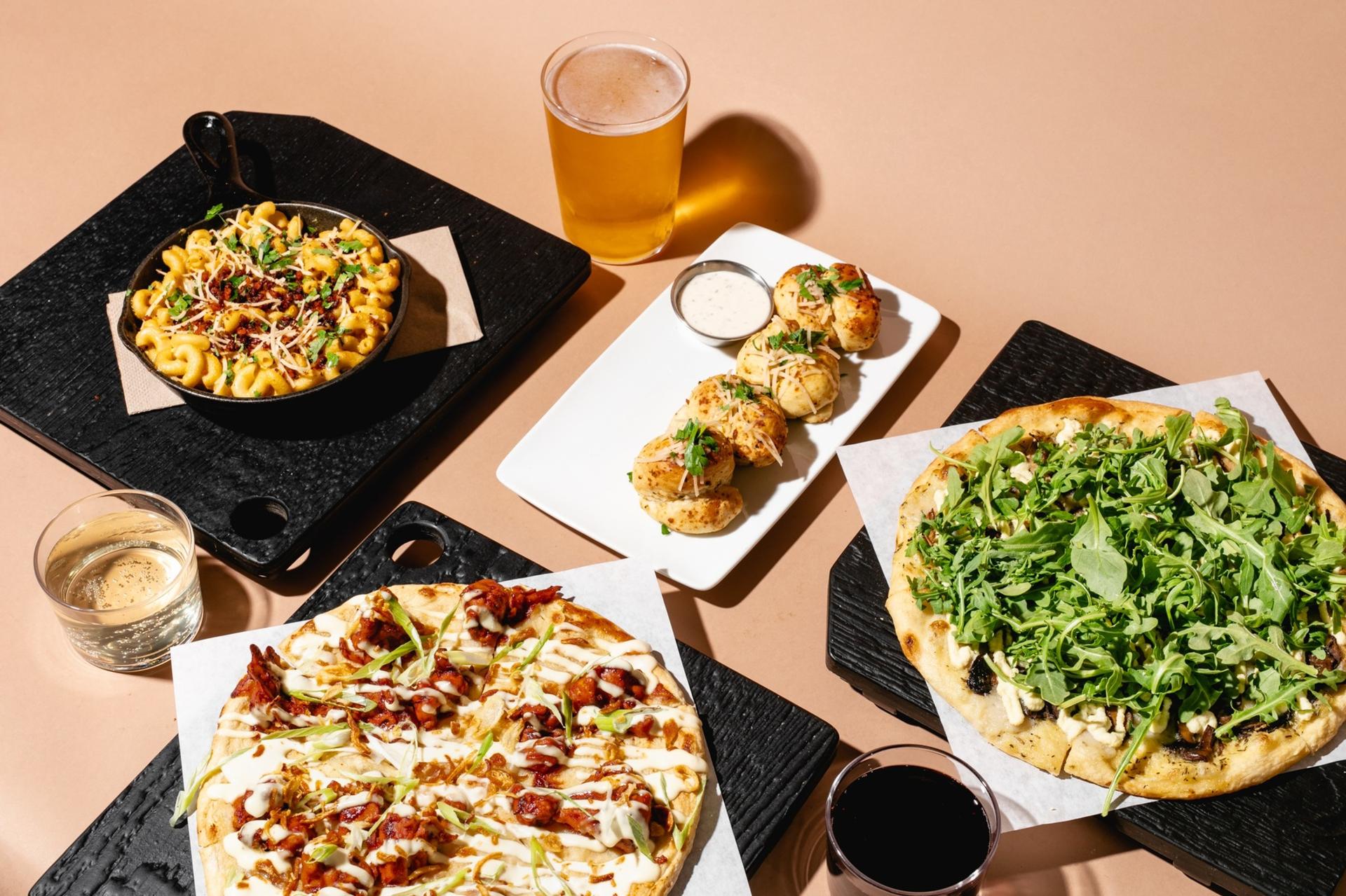 Virtuous Pie Victoria's pizza, appetizer and drinks spread
