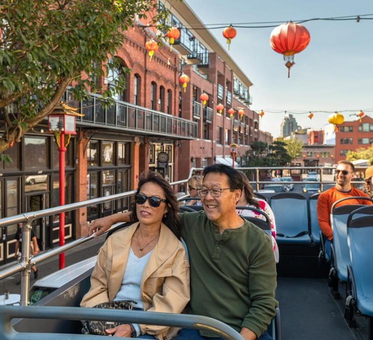 A hop on, hop off bus tour explore Chinatown in Victoria, BC