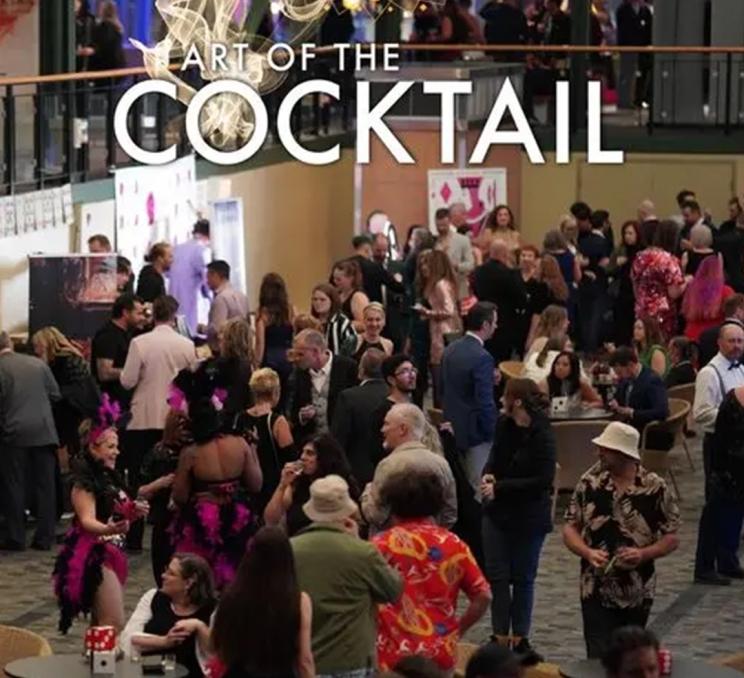 A poster for the Art of the Cocktail shows festival attendees enjoying cocktails inside the Crystal Garden in Victoria, BC