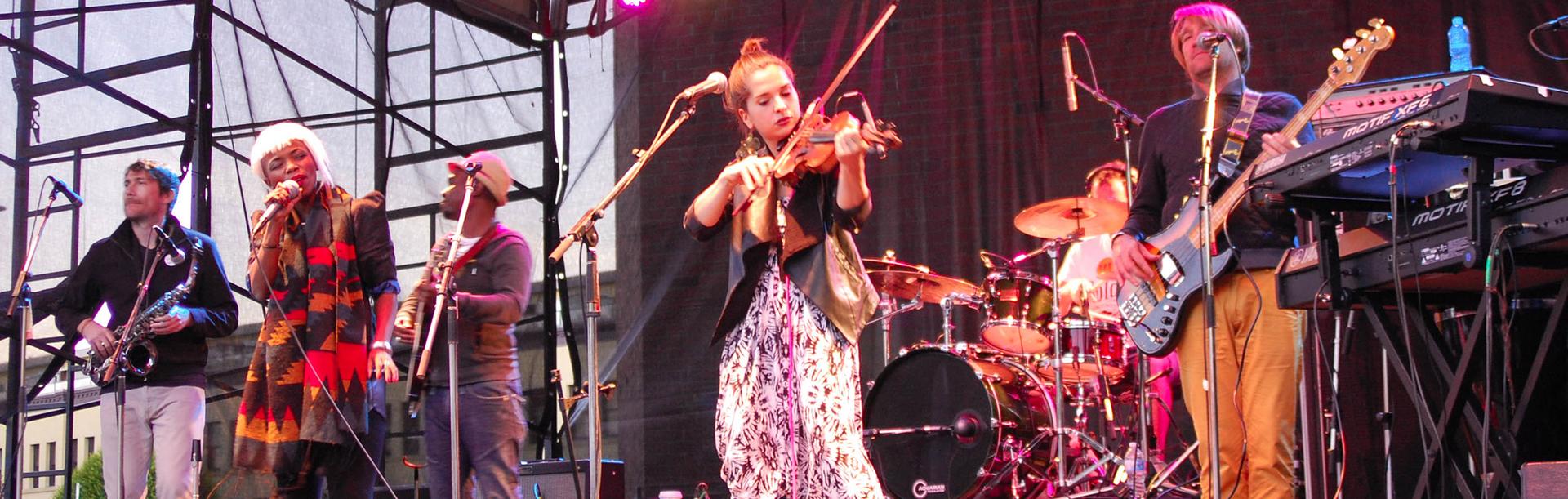 Musicians perform on stage at Victoria International Jazz Festival in Victoria, BC