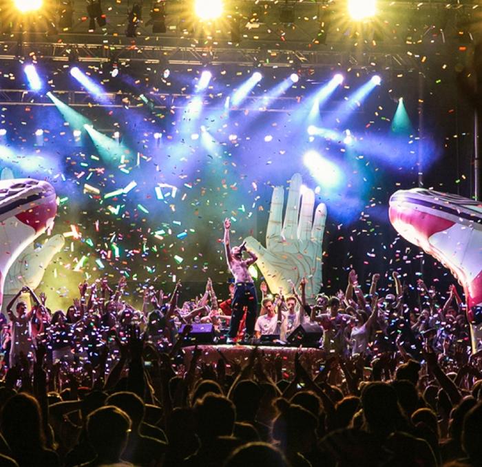 A performer on stage at Rifflandia, a music festival in Victoria, BC