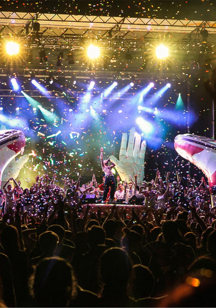 A performer on stage at Rifflandia, a music festival in Victoria, BC