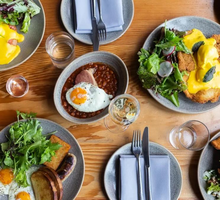 A spread of food at Eva Schnitzelhaus in Victoria, BC