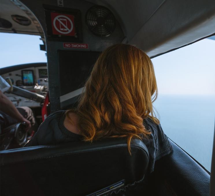 A woman aboard a Harbour Air Seaplanes flight to Victoria, BC