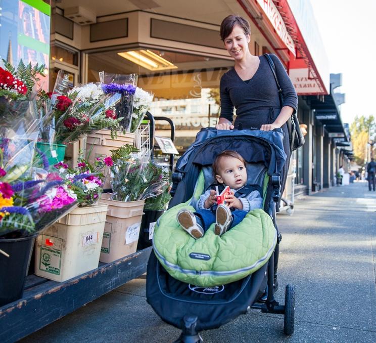 A woman and her child explore downtown Victoria, BC