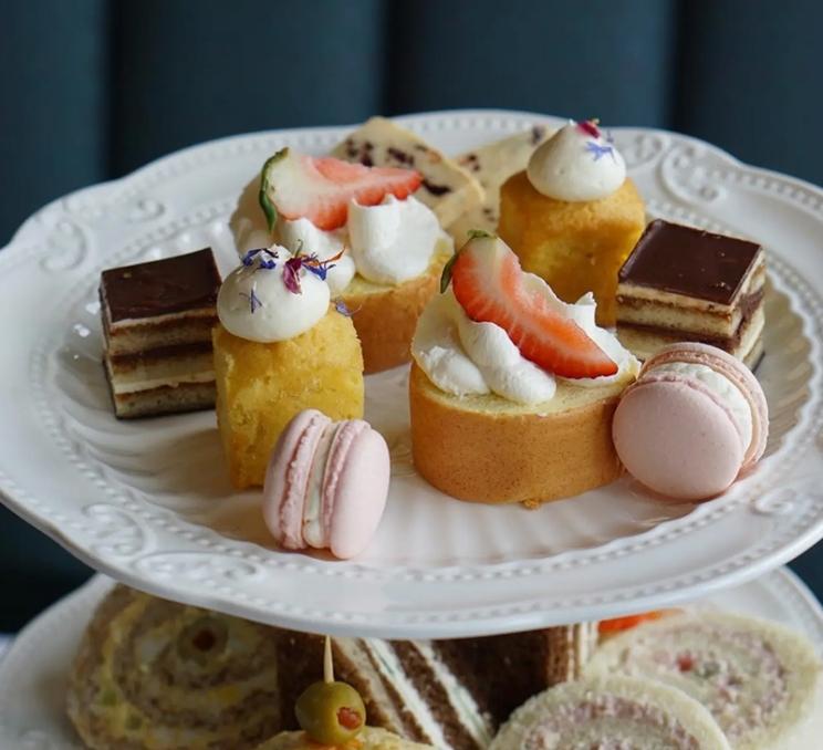 An assortment of baked goods and sandwiches at White Heather Tearoom in Victoria, BC
