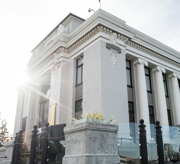 The facade of the iconic Steamship Terminal building in Victoria, BC, home to the Steamship Grill & Bar