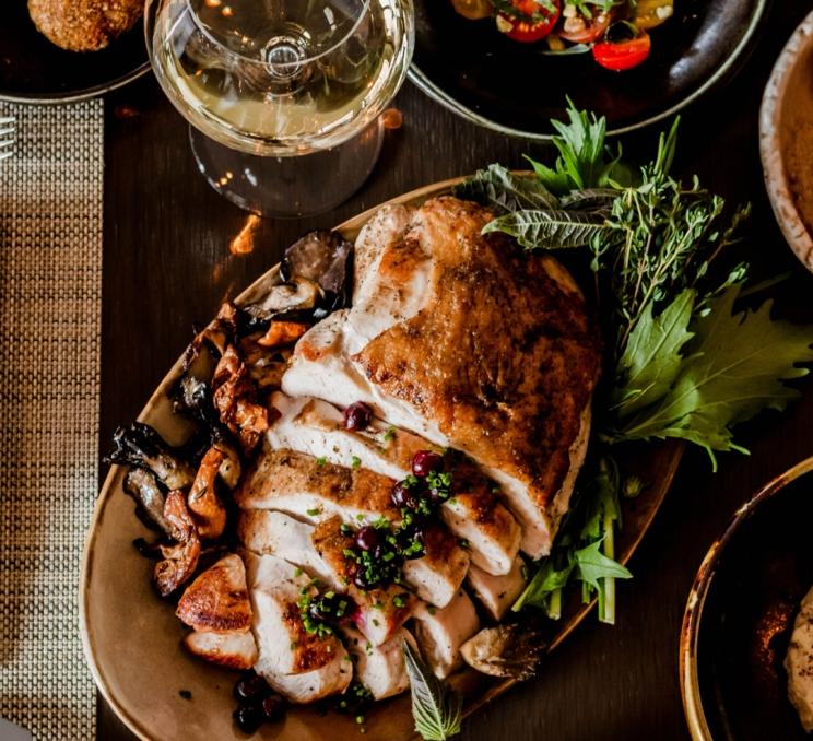 A Thanksgiving Feast at The Courtney Room featuring turkey and wine in Victoria, BC