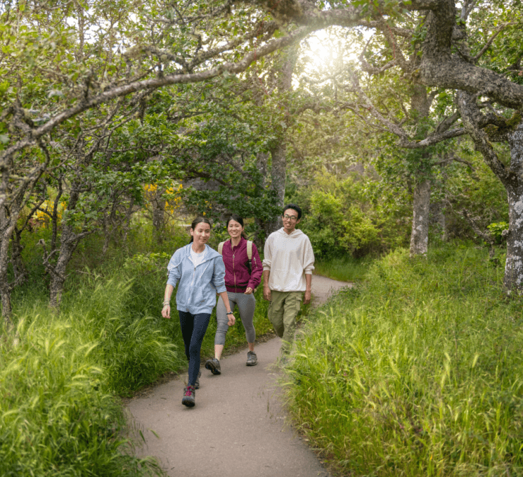 A group walking through Mount Douglas Park in Victoria, BC