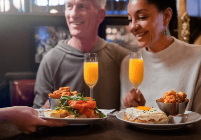 A couple dining at the Bard Banker in Victoria, BC
