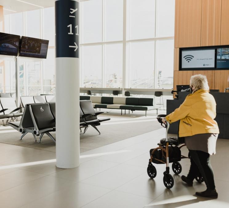 A woman using a wheelchair in Vancouver Airport