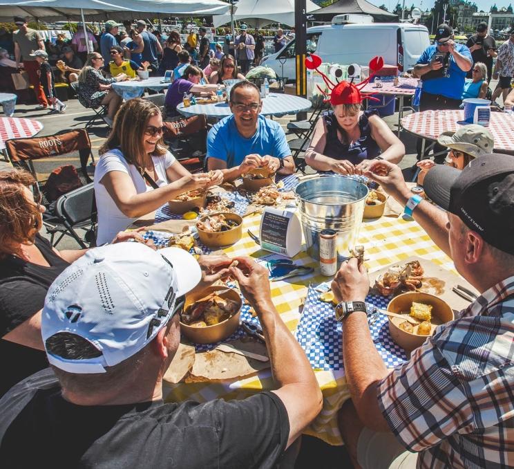 BC CrabFest Victoria Inner Harbour people enjoying Dungeness crab boil summer food festival Victoria BC