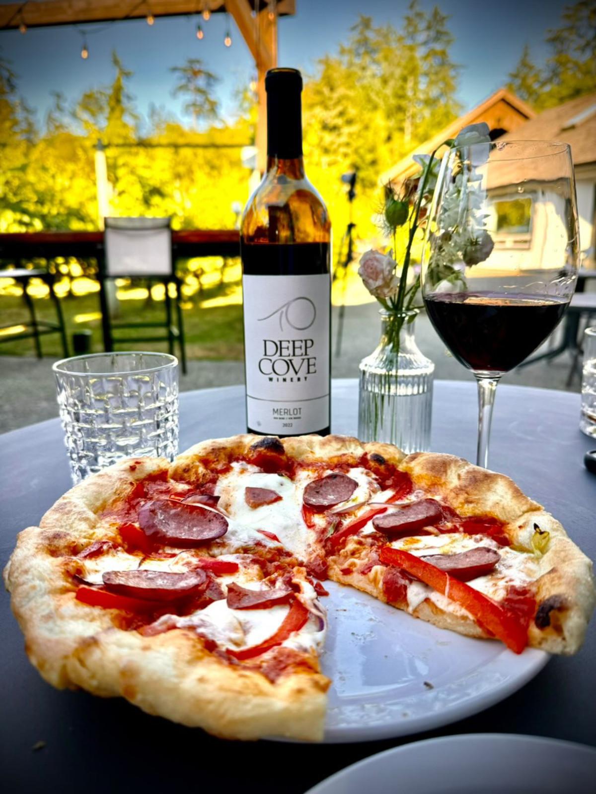 Enjoy a bottle of wine and a freshly-baked pizza!