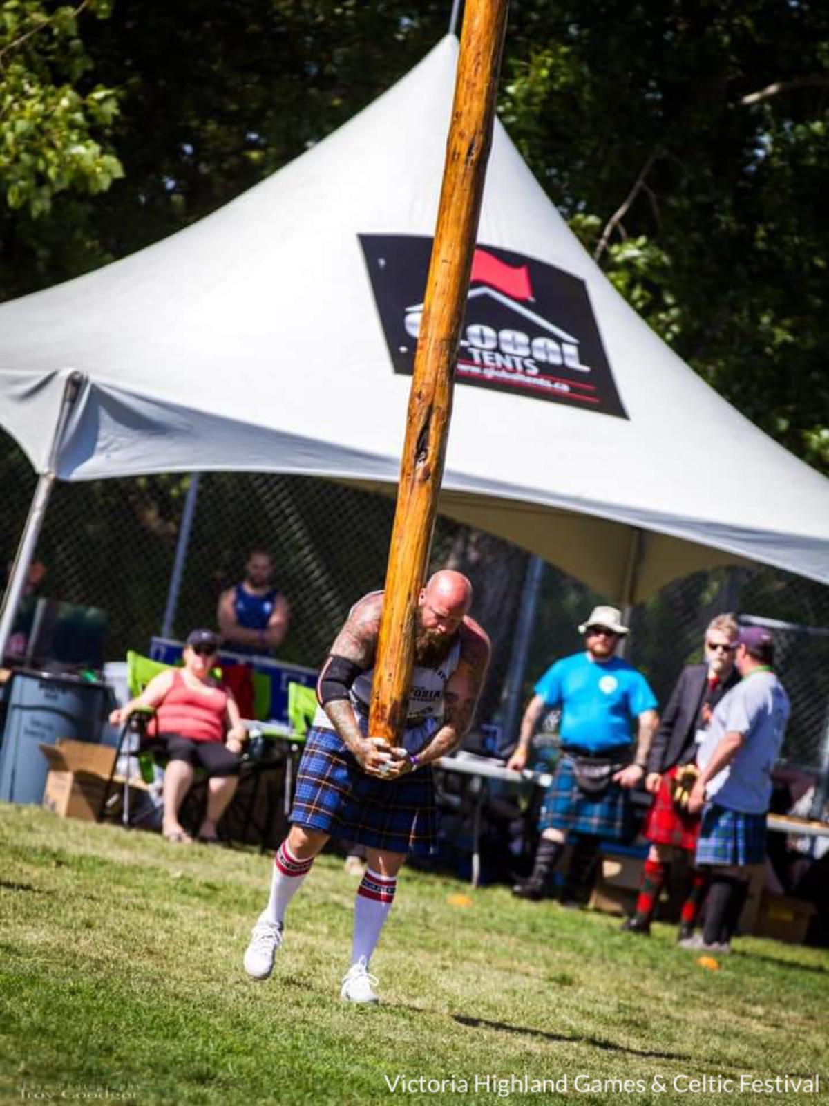The Ironman and Highland Games with a man lifting a pole