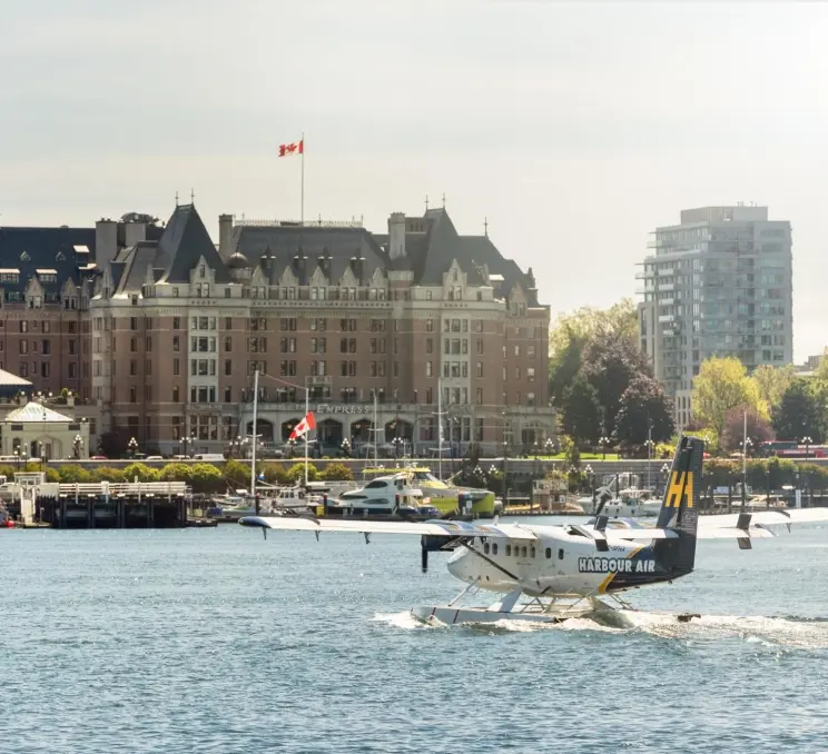 A Harbour Air seaplane lands in Victoria's Inner Harbour