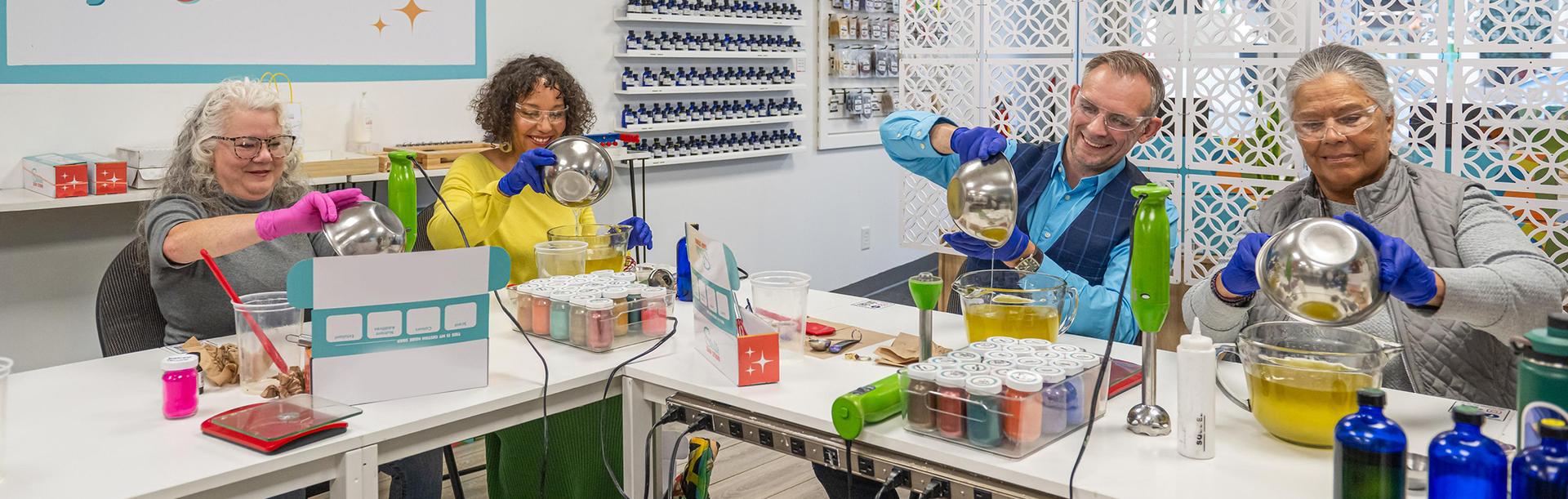 A couple participates in a soap making workshop in Victoria, BC