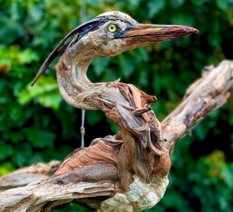 A driftwood sculpture of a heron in Victoria, BC