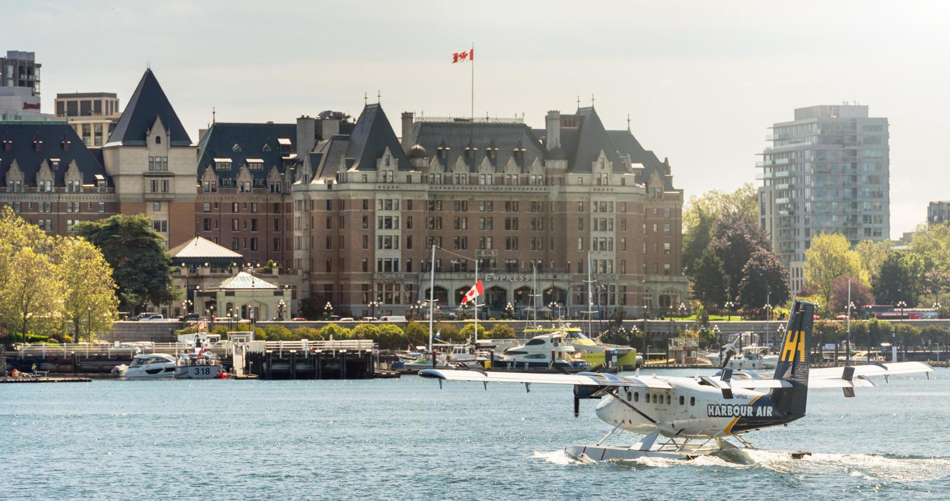 A Harbour Air Seaplane lands in the Inner Harbour of Victoria, BC