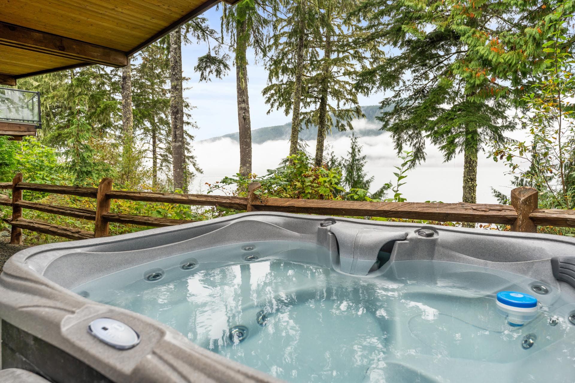 Hot tub oceanfront cottage view Port Renfrew, BC