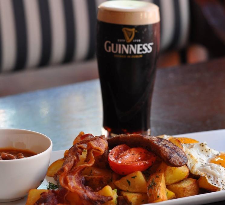 A brunch and a pint of Guinness is served at the Irish Times in Victoria, BC