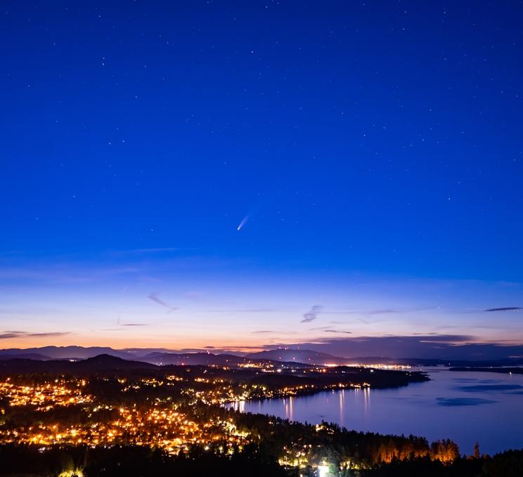 A comet in the sky above Greater Victoria as seen from PKOLS (formerly Mount Douglas) Regional Park
