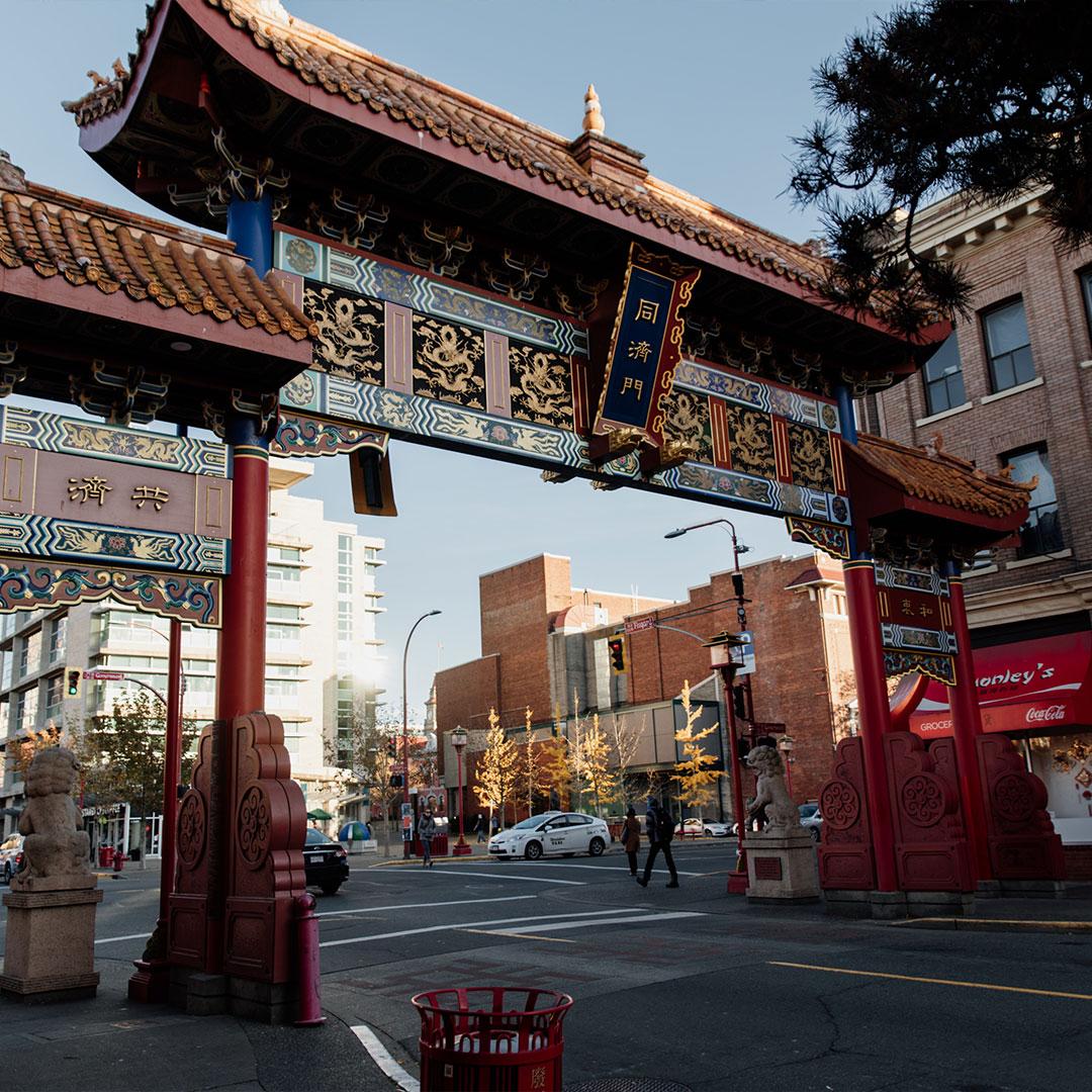The Gate of Harmonious Interest at sunrise in Victoria, BC's Chinatown