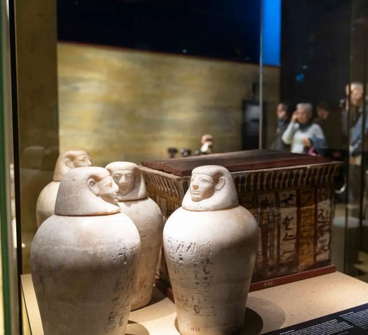 An exhibit shows ancient Egyptian artifacts at Ancient Egypt: Obsessed with Life at the Royal BC Museum in Victoria, BC