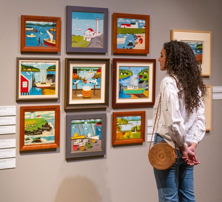 A woman admires the artwork at the Art Gallery of Greater Victoria in Victoria, BC