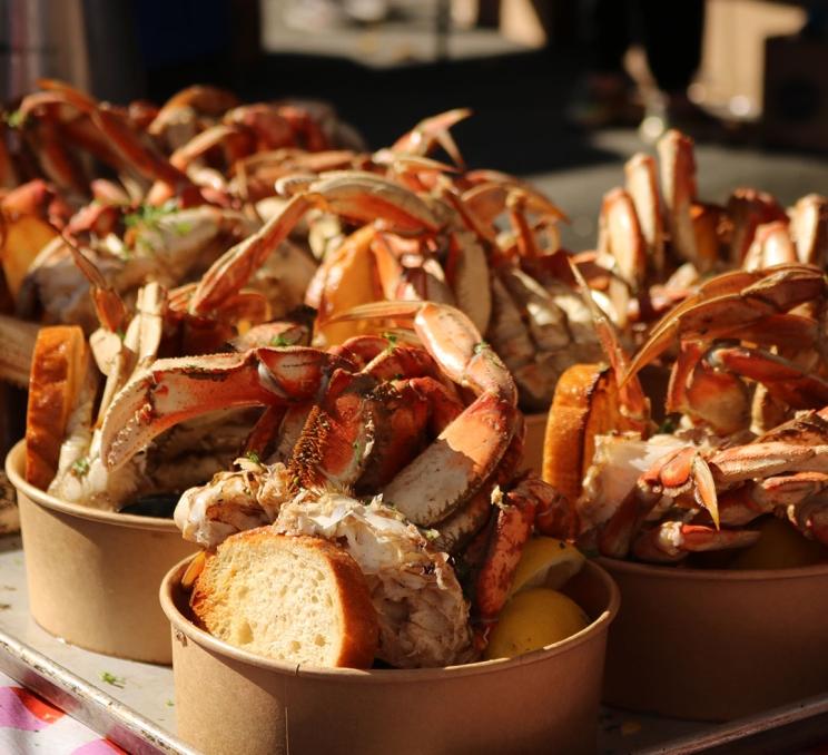 Crab boil buckets of fresh BC Dungeness crab during BC CrabFest in Victoria, BC