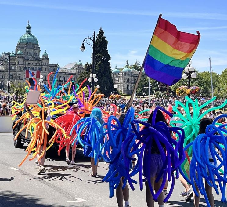 Victoria Pride Parade Inner Harbour Victoria BC rainbow flag crowd Pride Week July LGBTQ+ celebration event