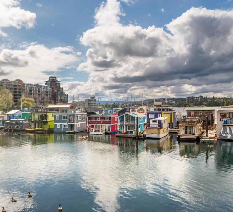 Fisherman's Wharf, a eclectic floating neighbourhood on Victoria, BC's Inner Harbour features vibrantly coloured floating homes and businesses