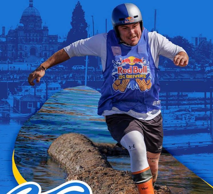Red Bull Log Drivers competitor balancing on log Victoria Inner Harbour BC summer event extreme sport challenge