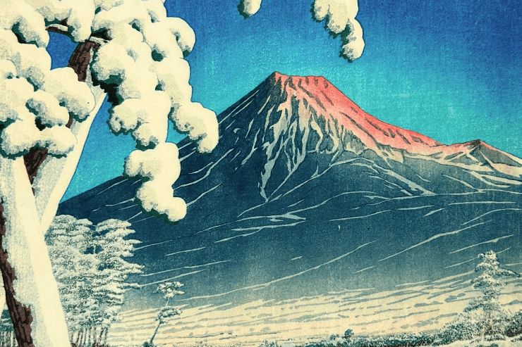 Woodblock-style artwork of a snow-covered mountain peak framed by snow-laden trees under a bright blue sky.