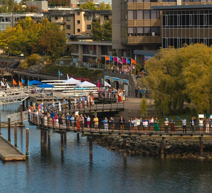 Cast members of the hit Netflix show Crew Girl cheer on Easton Prep during their regatta along the Selkirk Waterfront in Victoria, BC