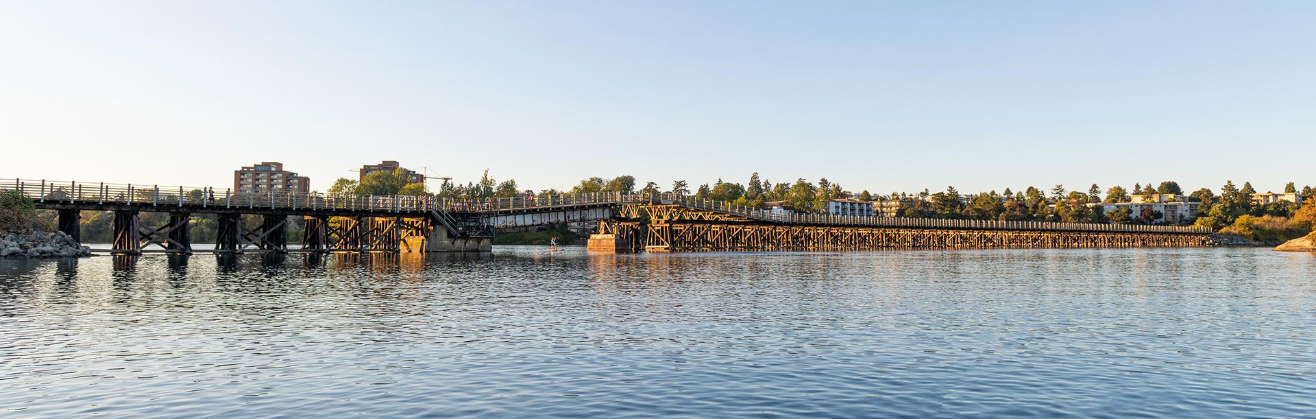 The Selkirk Trestle spans the Gorge Waterway at sunset in Victoria, BC