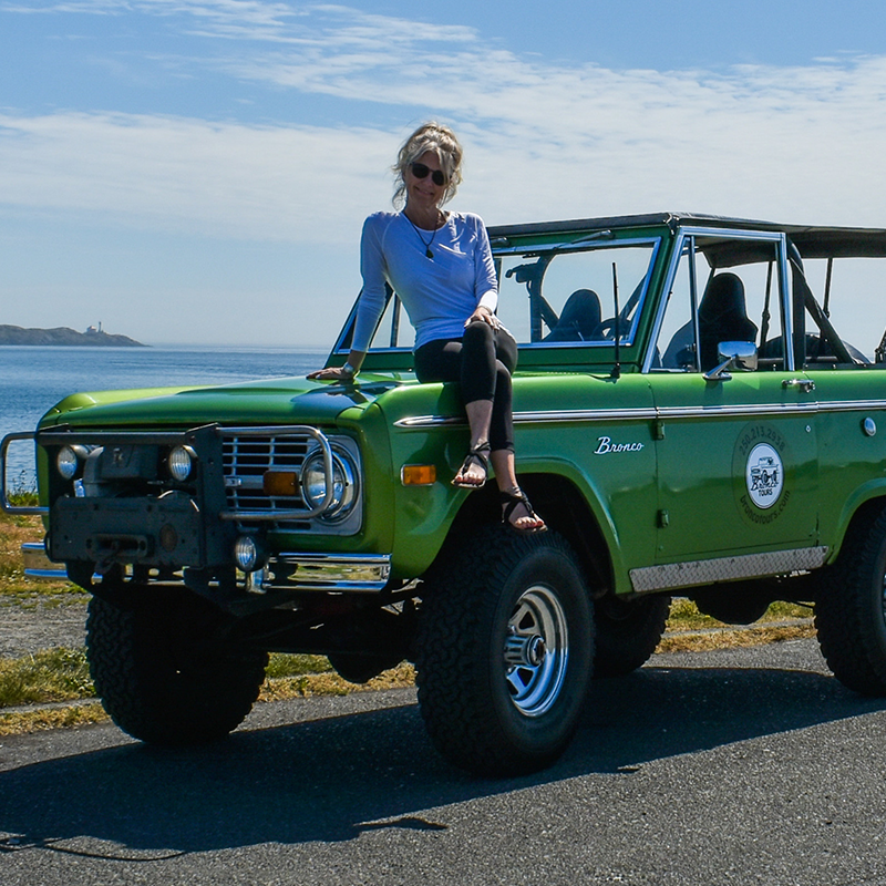 Bronco Tours in Victoria with owner Deanna sitting on her vintage 1974 Ford Bronco
